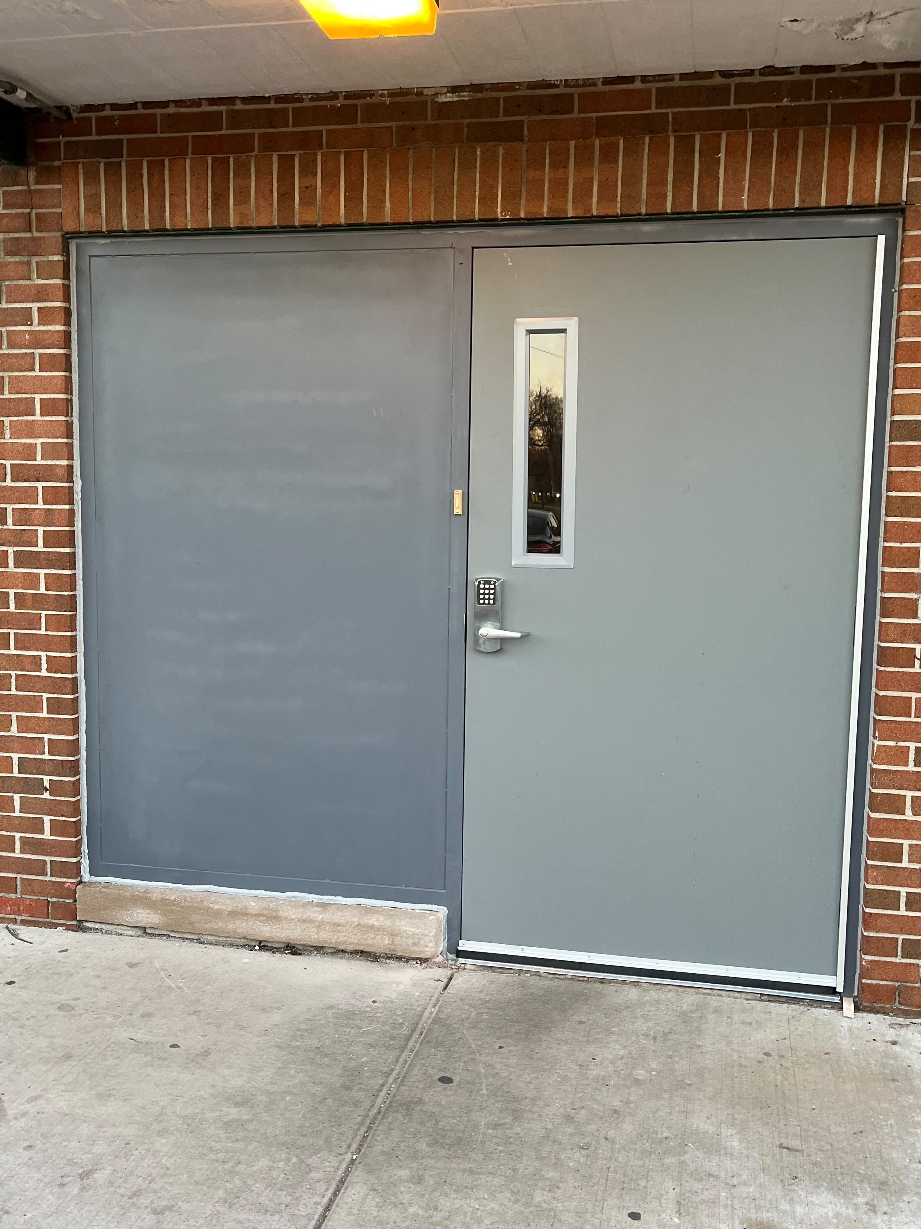 Hollow metal commercial door with keypad access